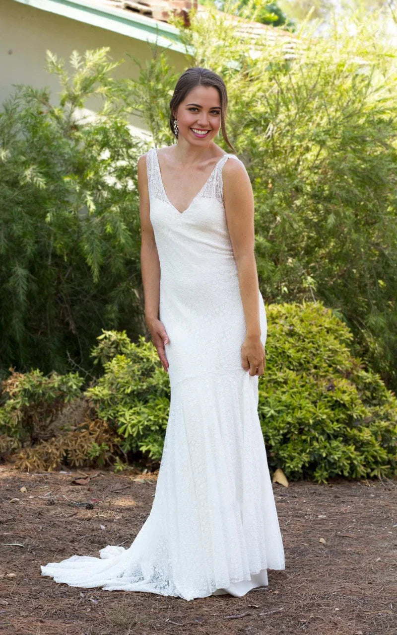 Vestido de novia estilo bohemio con encaje de sirena y espalda baja